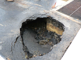 Sinkhole Formation in Driveway Sinkhole Formation in Driveway